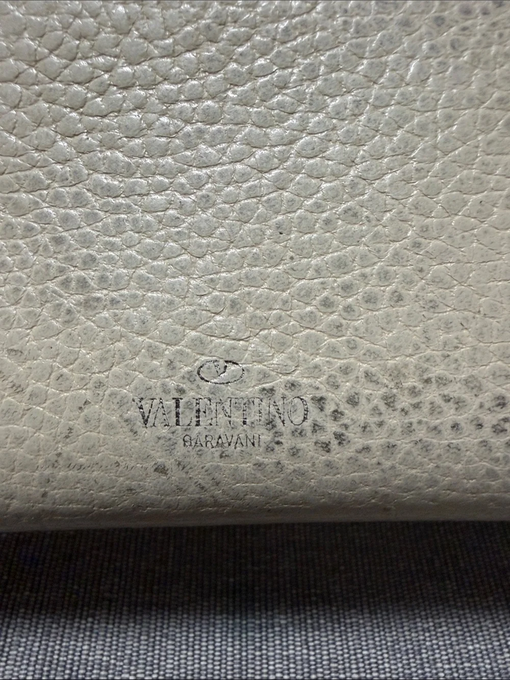 AUTHENTIC Valentino Garavani Cream Pebbled Leather Zip Wallet with Stud Accents